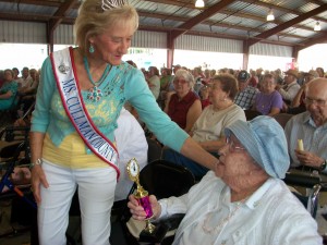 Elma Bradford is congratulated by Ms. Senior Cullman County