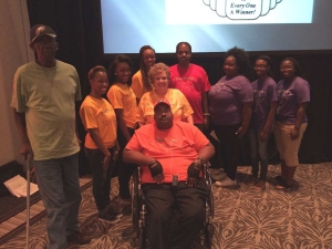 Lawson State Community College students helped Oak Trace Care & Rehab Center implement “Music & Memory” for nursing home residents. Pictured seated: Oak Trace resident Arnold Mushatt. Standing from left to right: Oak Trace resident Clarence Todd; Lawson State students Renee Burrough, Jalia Wilkins and Brenda Hardy; Oak Trace Administrator Trina Vines; Oak Trace Resident Leonard Hinton; Lawson State students Chrystal Thompson, Tiaira Trammel and Sunkeissa Cantrell.