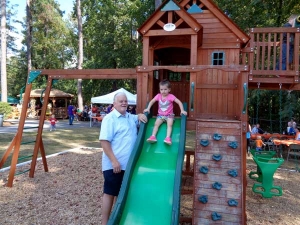 Families enjoy Phenix City Health Care's new playground during the Family Day Picnic on Saturday, October 11, 2014.