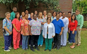 West Gate Village staff members.