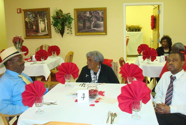 From left to right: Orchard Rehab & HealthCare Center resident Joe Holcombe and his Bertha Holcombe, and residentHayward Lasiter. This photo was taken at Orchard's 2015 Valentine's Banquet.