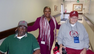 Shonda Young with Johnny McIntyre, left, and Charlie Byrd, residents of Bill Nichols State Veterans Home.