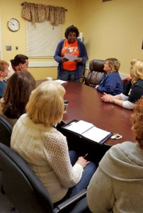 Oak Park Director of Nursing Amy Roberts, RN, shares information from a recent Alabama Nursing Home Association committee meeting with her staff.