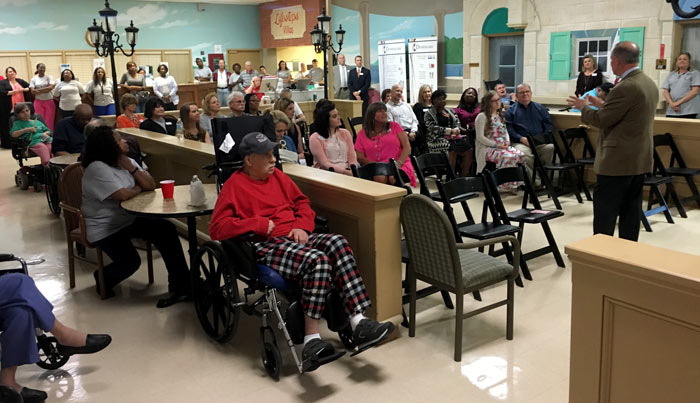 Residents, staff and community leaders at Lynwood's Award of Excellence celebration.