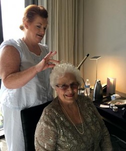 Katye Giddens of Crowne Health Care of Greenville styles Millie McDonald's hair and places her crown before the Ms. Alabama Nursing Home Pageant.
