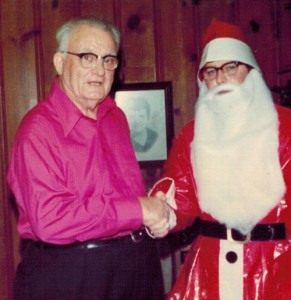 Dr. John Burns greets Santa during a visit to Burns Nursing & Rehab.