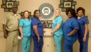 From left to right: Maintenance Director James Charleston, Director of Nursing Rhonda Lloyd, CNA Kimberly Mott, LPN Charge Nurse Dana Beck, CNA Tammy Cole and Restorative CNA Elaine Allen.
