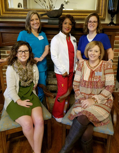 Crowne Health Care of Mobile's dental services team. Front row from left to right: Director of Social Services Meagan Gantt, LBSW; and Bookkeeping Assistant Kathy Croft/ Back row from left to right: Social Services Designee Sarah Redditt; Nursing Supervisor Diane Eaton, RN; and Social Services Designee Keri Jones.