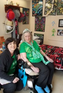 Kim Allred, left, and resident Joan Edwards. Ms. Edwards uses art as a form of expression.