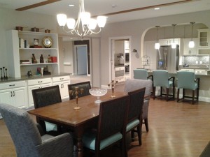 Dining room and kitchen inside a skilled nursing household at Fair Haven.